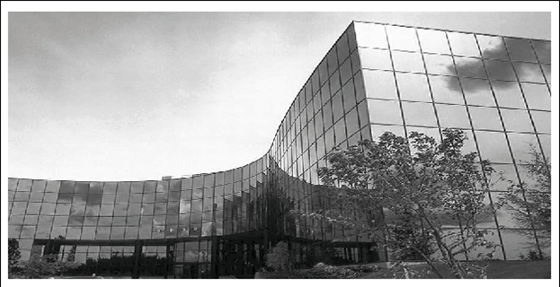 A black and white photo of an office building.